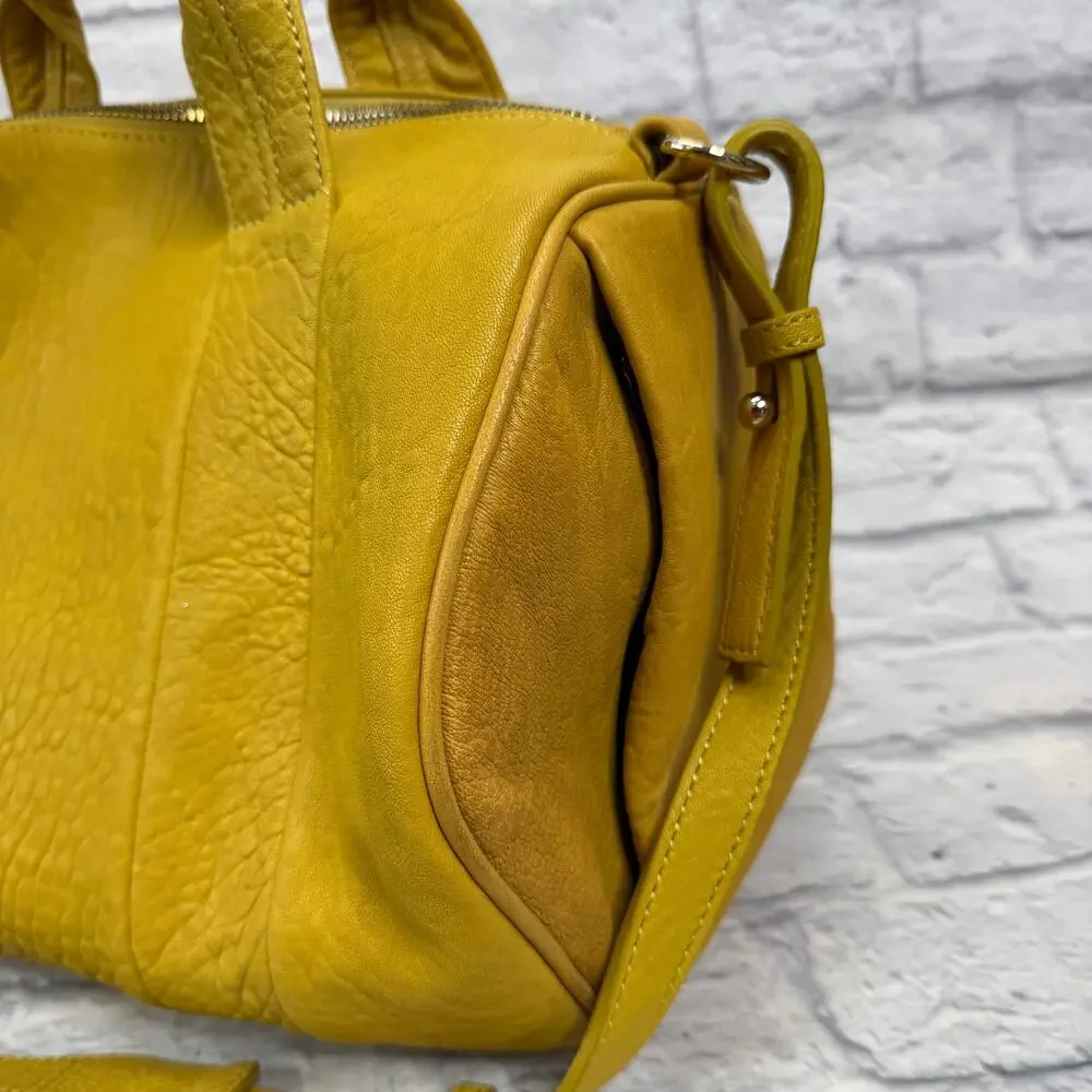 Alexander Wang Rocco Duffel Bag Mustard Yellow Pebbled Leather Studded Bottom